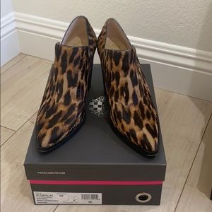 Vince Camuto leopard hair material boots.